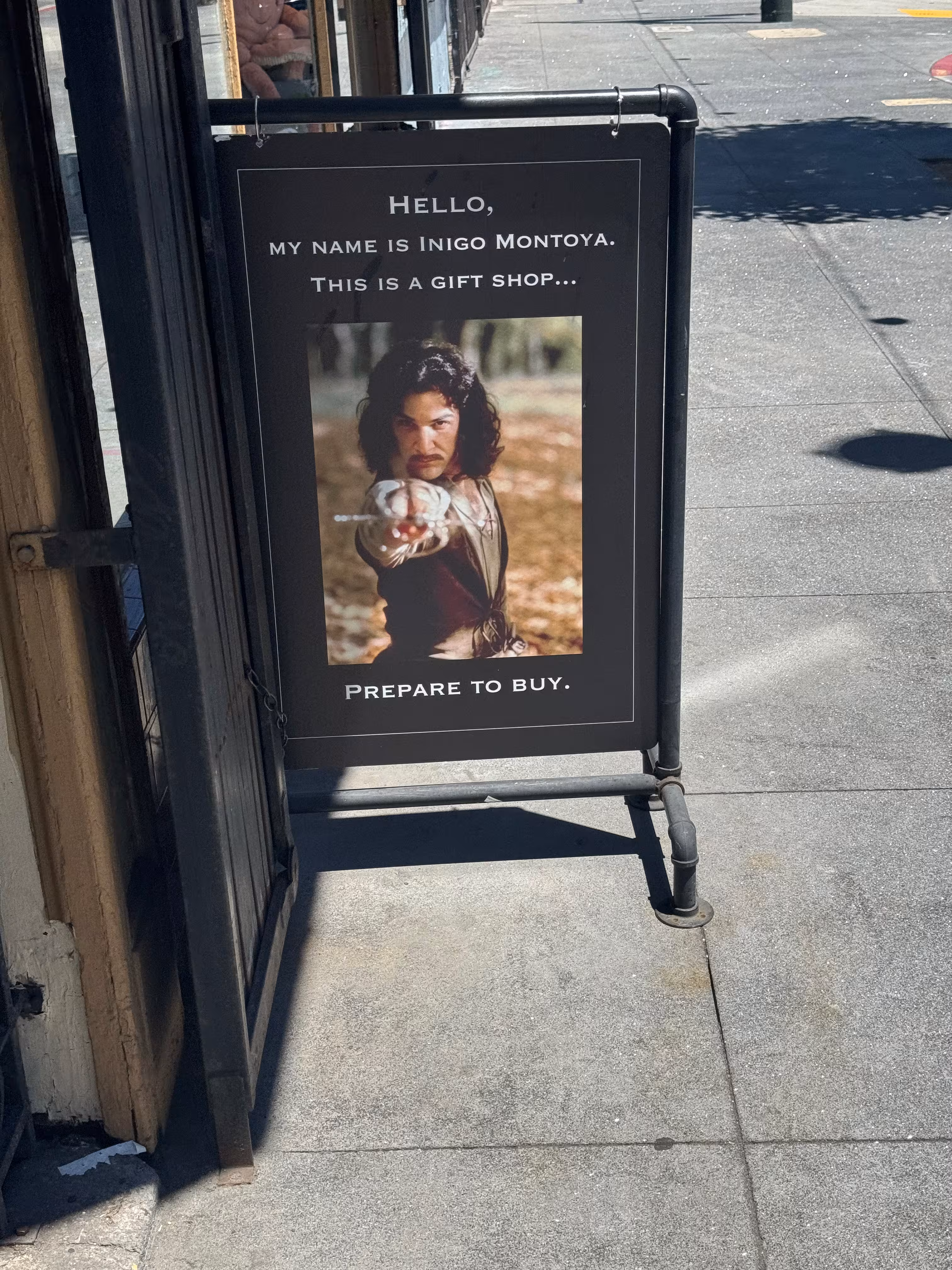 A sign with the caption 'My name is Inigo Montoya, This is a Gift Shop, Prepare to Buy.